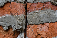 Cracks in a brick chimney requiring Asbury Park chimney service